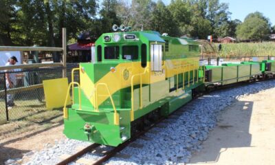 IMG_9626 a green train parked at a park